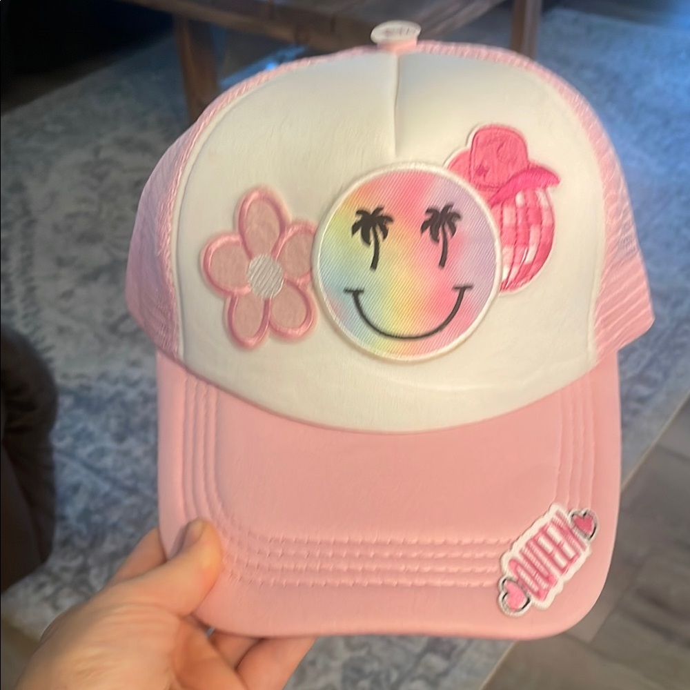 Pink and White Trucker Hat with Smiley Patch